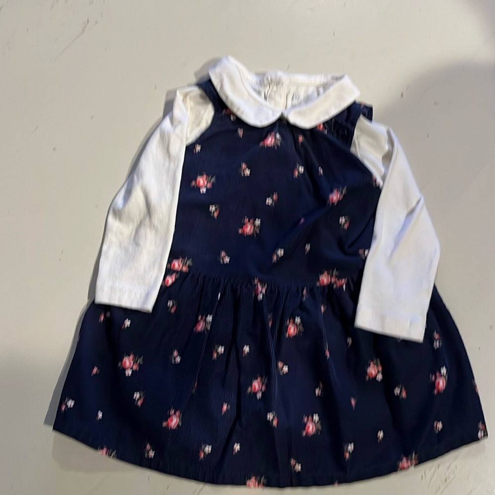 Blue floral corduroy dress with collared shirt.